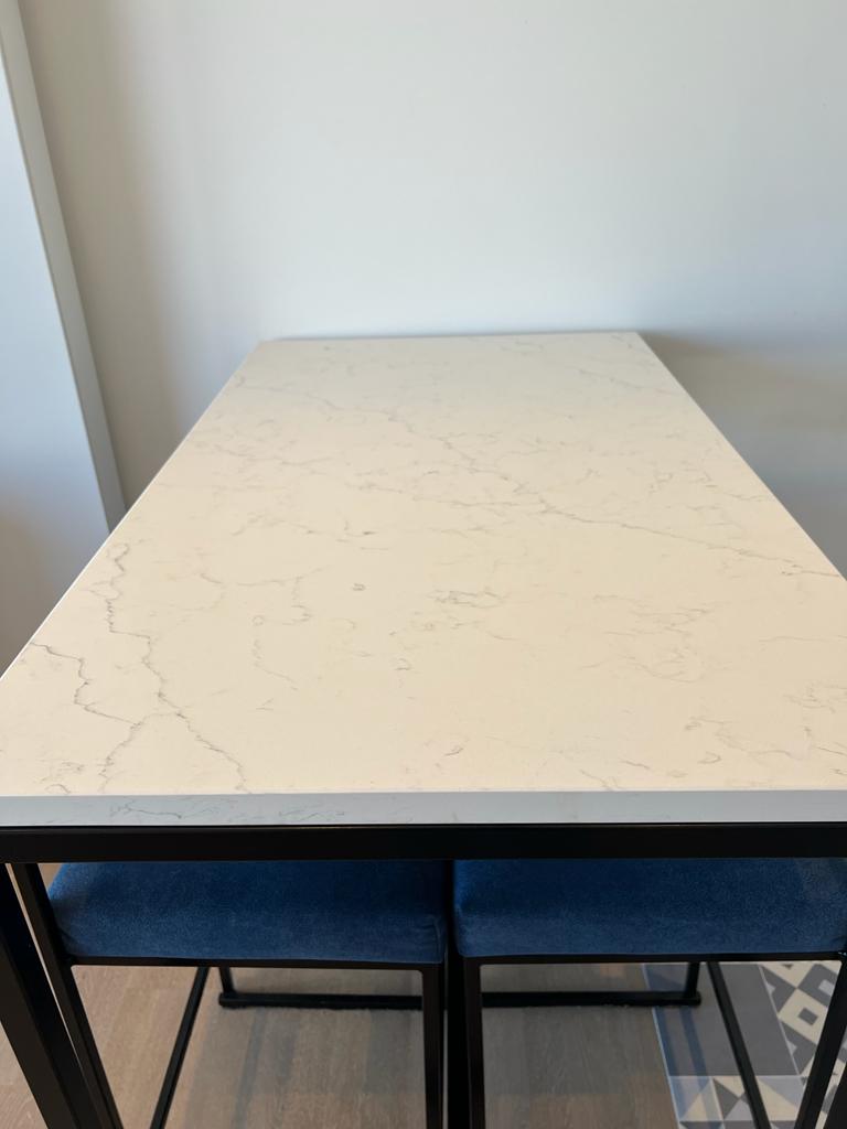 Calcatta Gold Breakfast Bar- RESS Furniture Ltd. Top Close Up